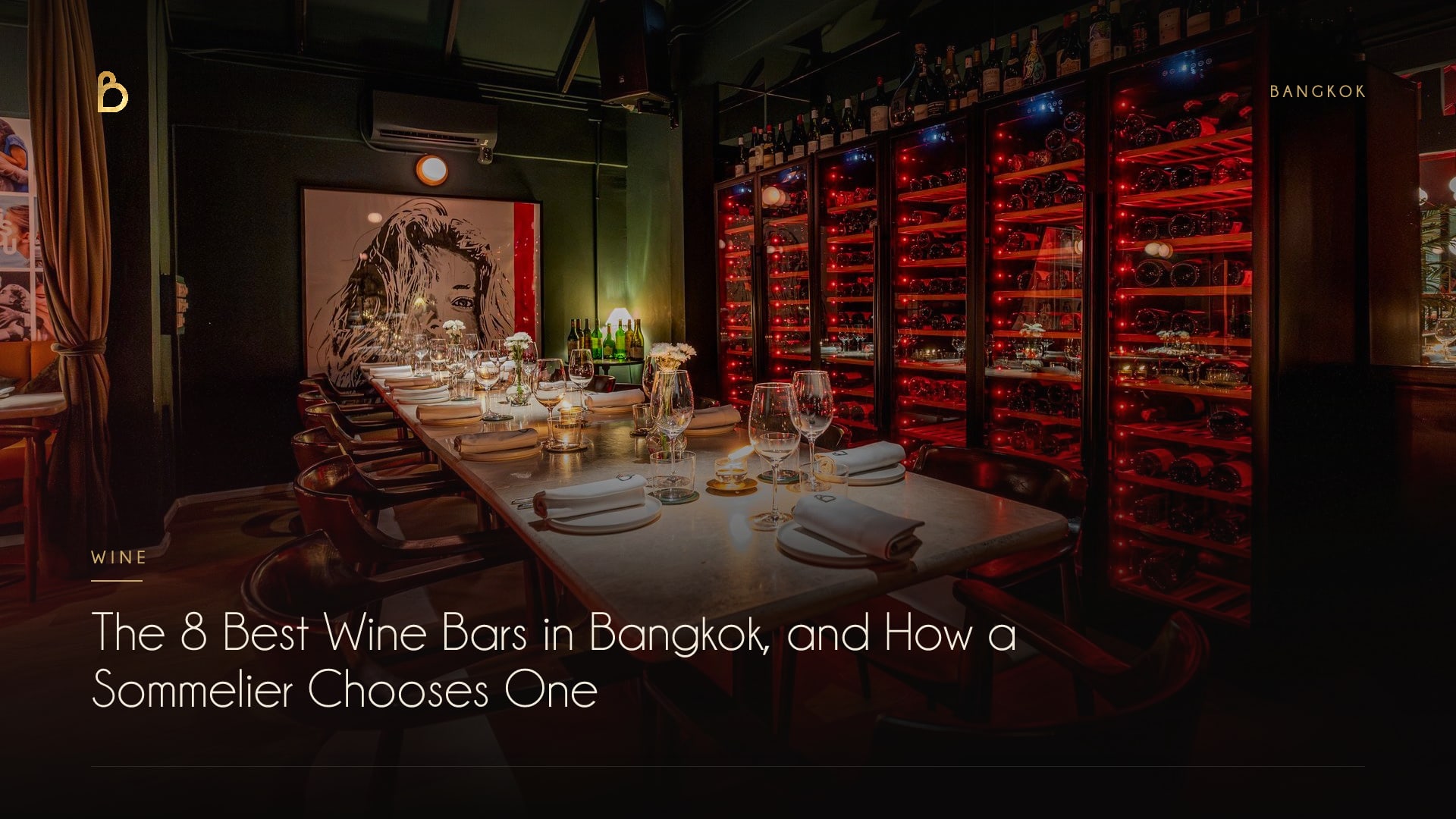 The wine cellar at Bisou, a modern French restaurant on Soi Langsuan in Bangkok, lit in deep red