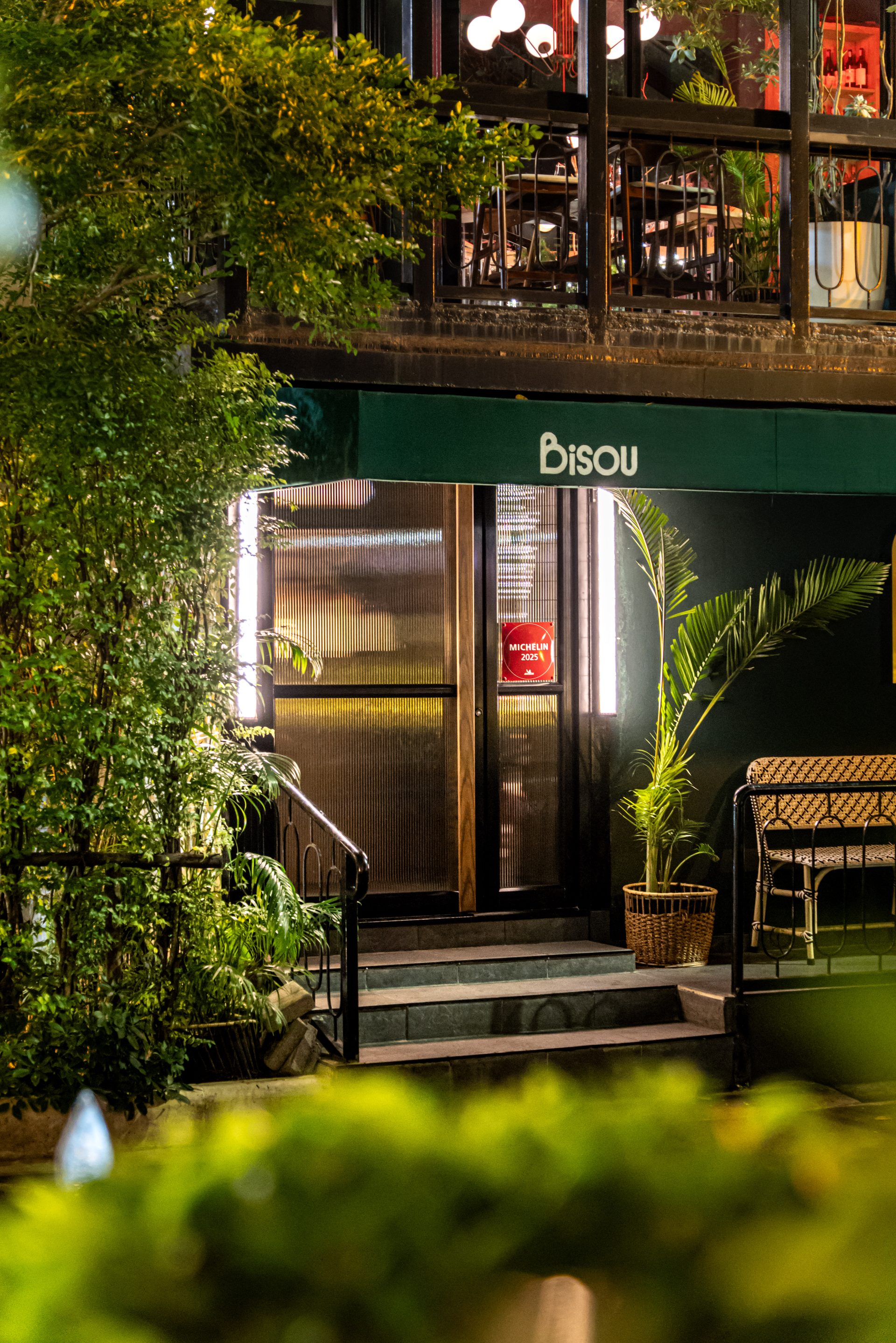The Bisou Bangkok entrance at night