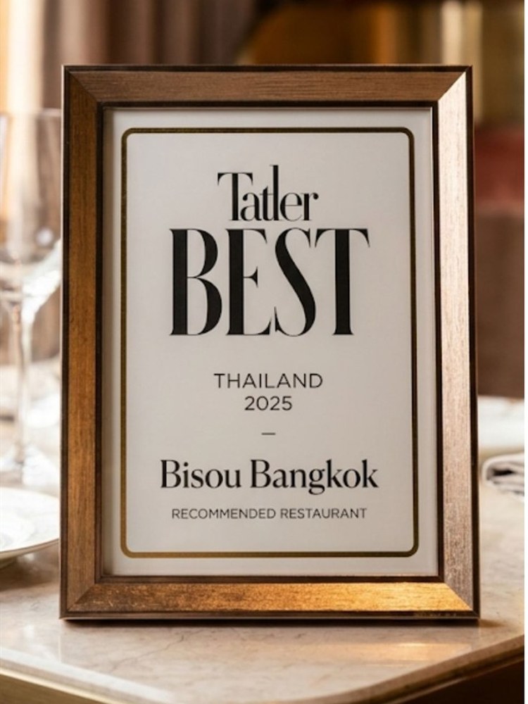 The Tatler Best Restaurants Thailand 2025 plaque at Bisou Bangkok