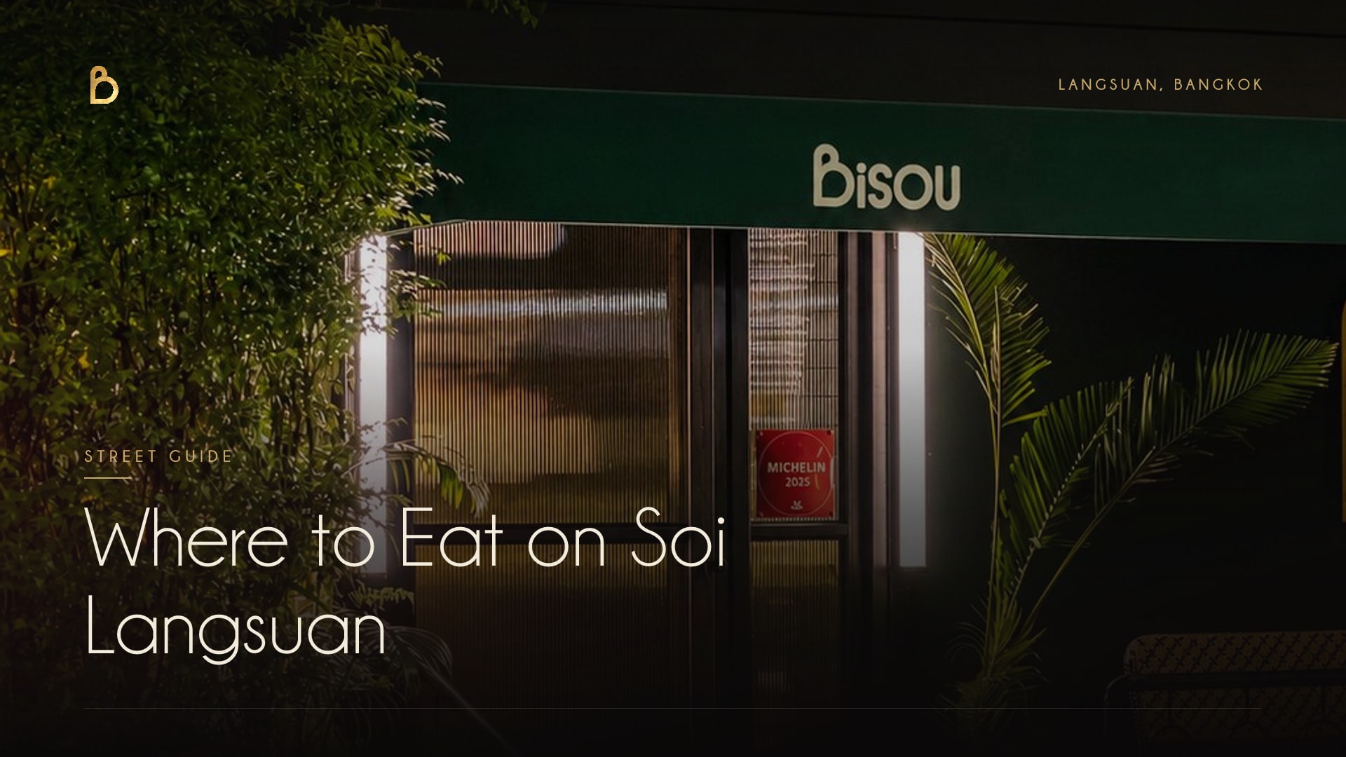 The lit facade of Bisou, a modern French restaurant on Soi Langsuan 9, Lumphini, Bangkok